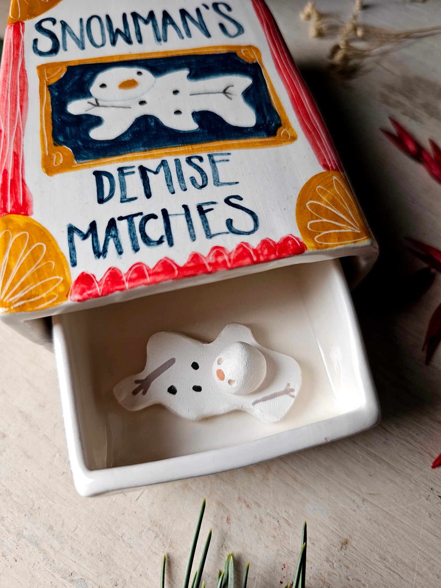 Made to order: The Snowman's Demise large ceramic matchbox