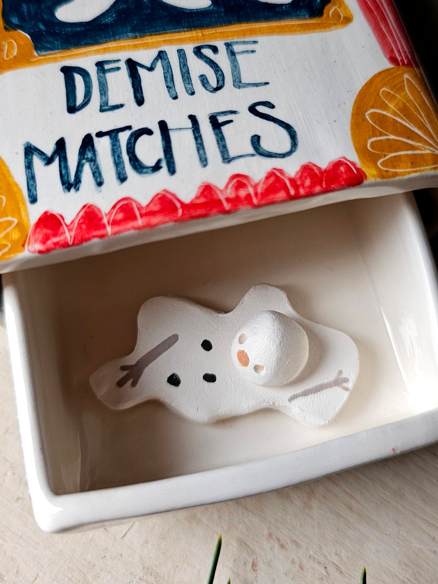 Made to order: The Snowman's Demise large ceramic matchbox