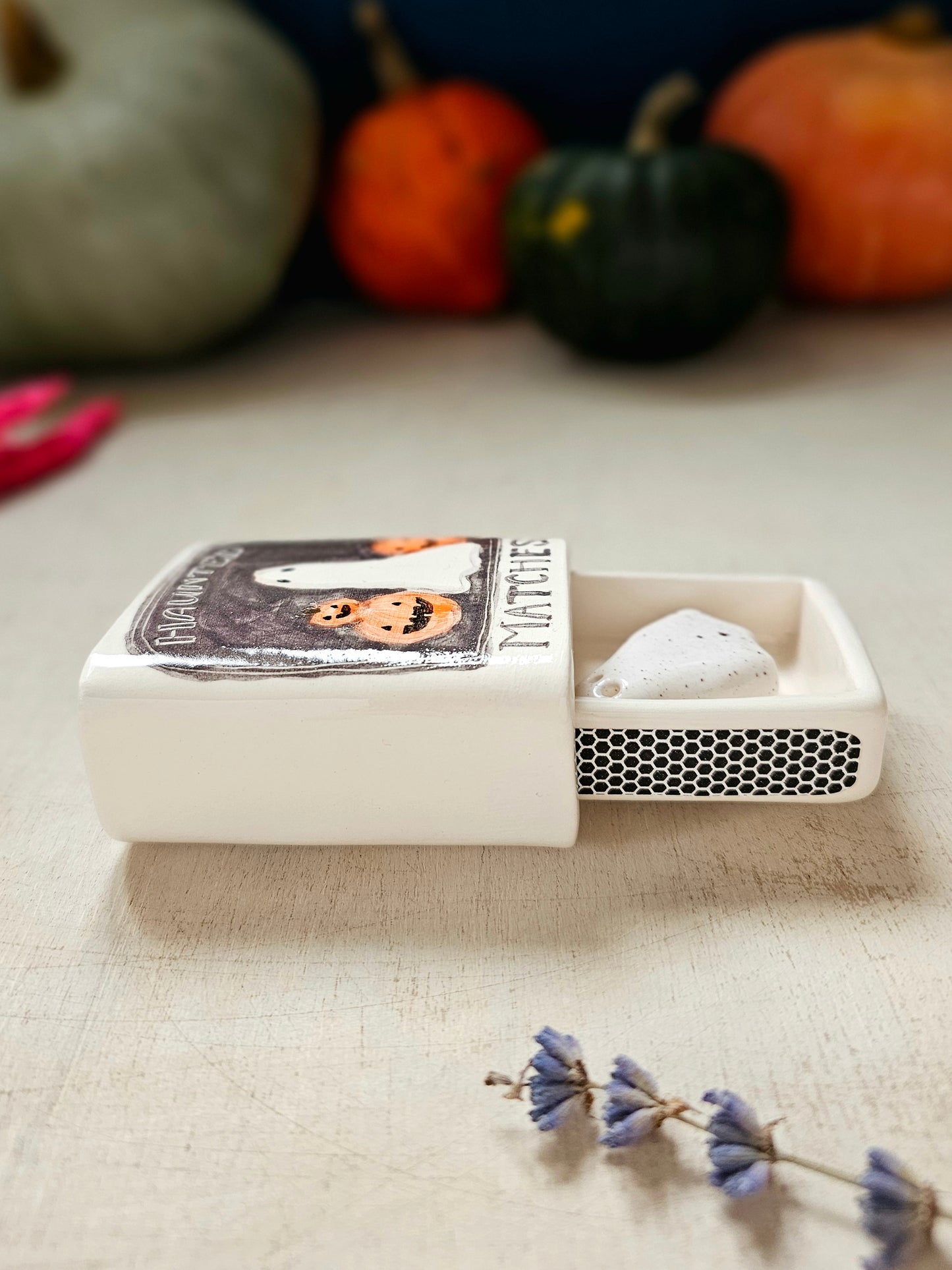 The haunted small ceramic matchbox with mini ghost