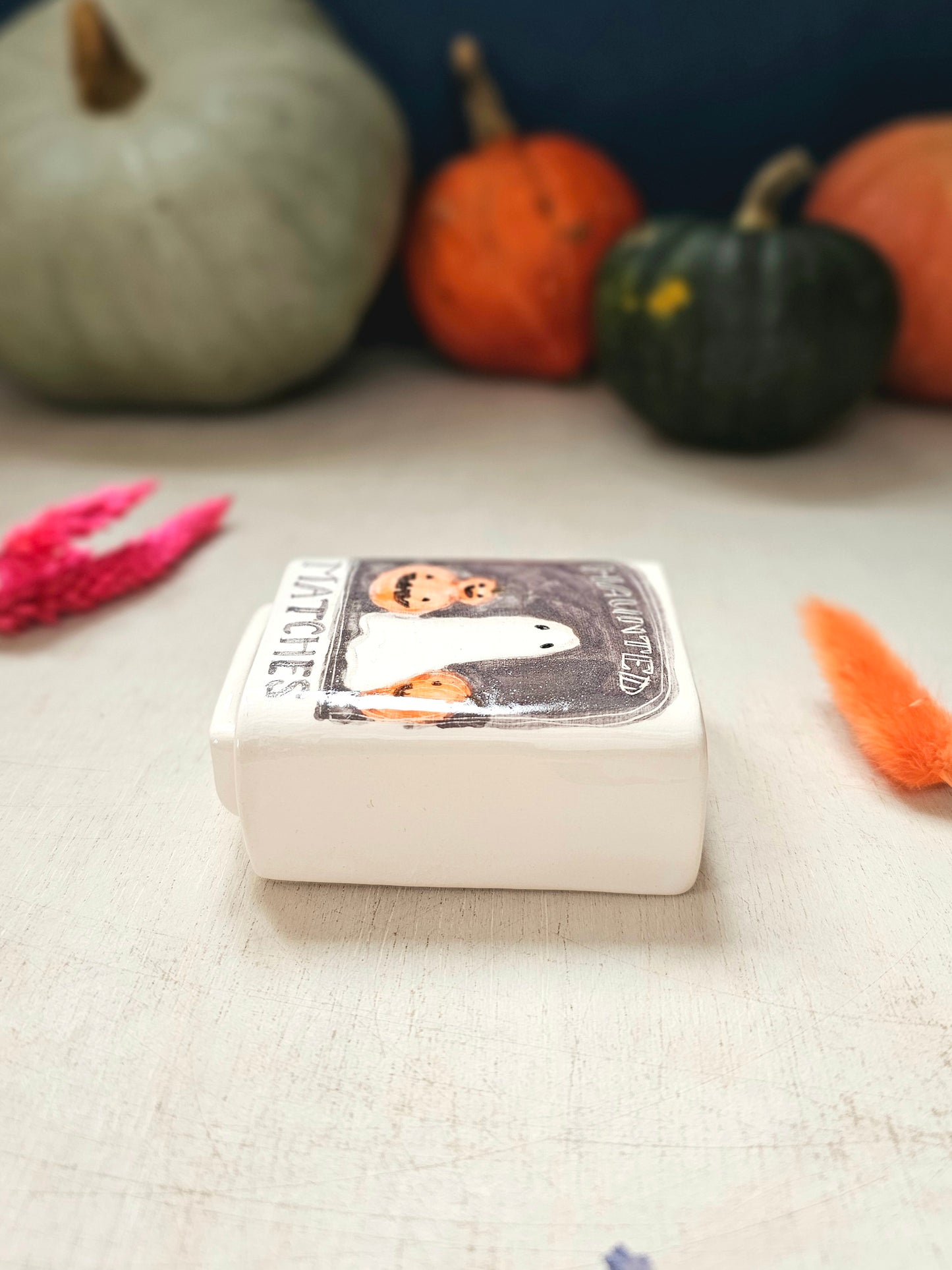 The haunted small ceramic matchbox with mini ghost