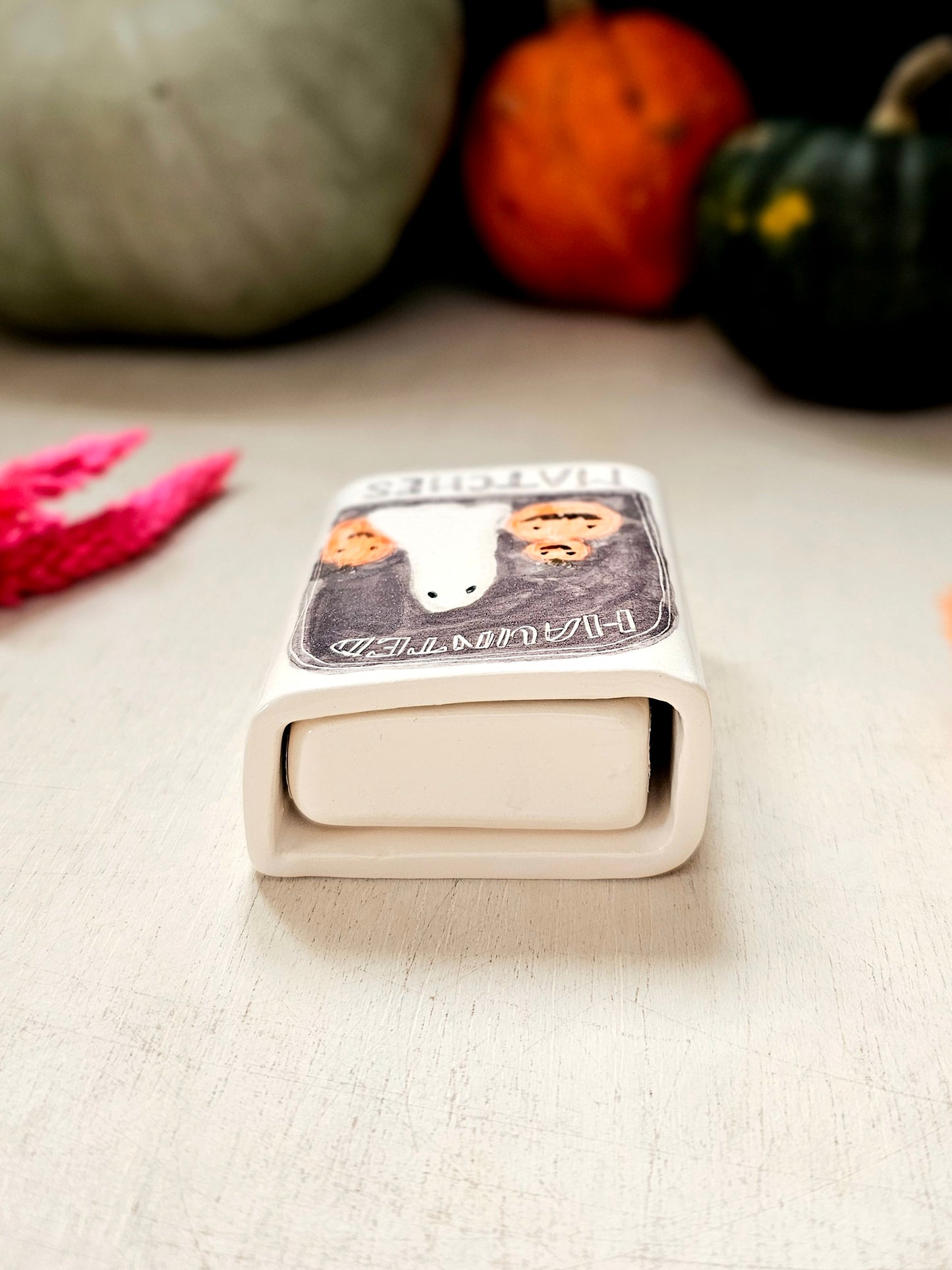 The haunted small ceramic matchbox with mini ghost