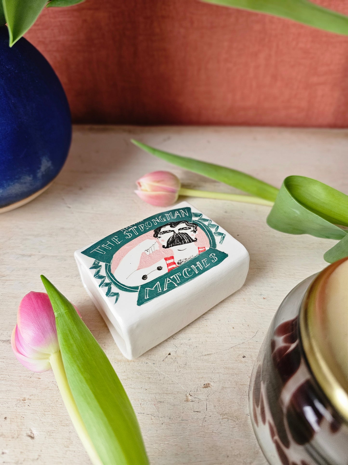 Hector the strongman ceramic small matchbox